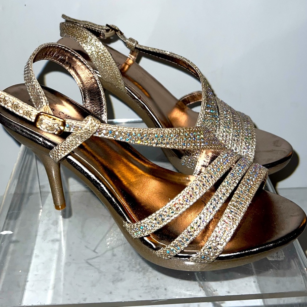 Glittery gold strapped heels